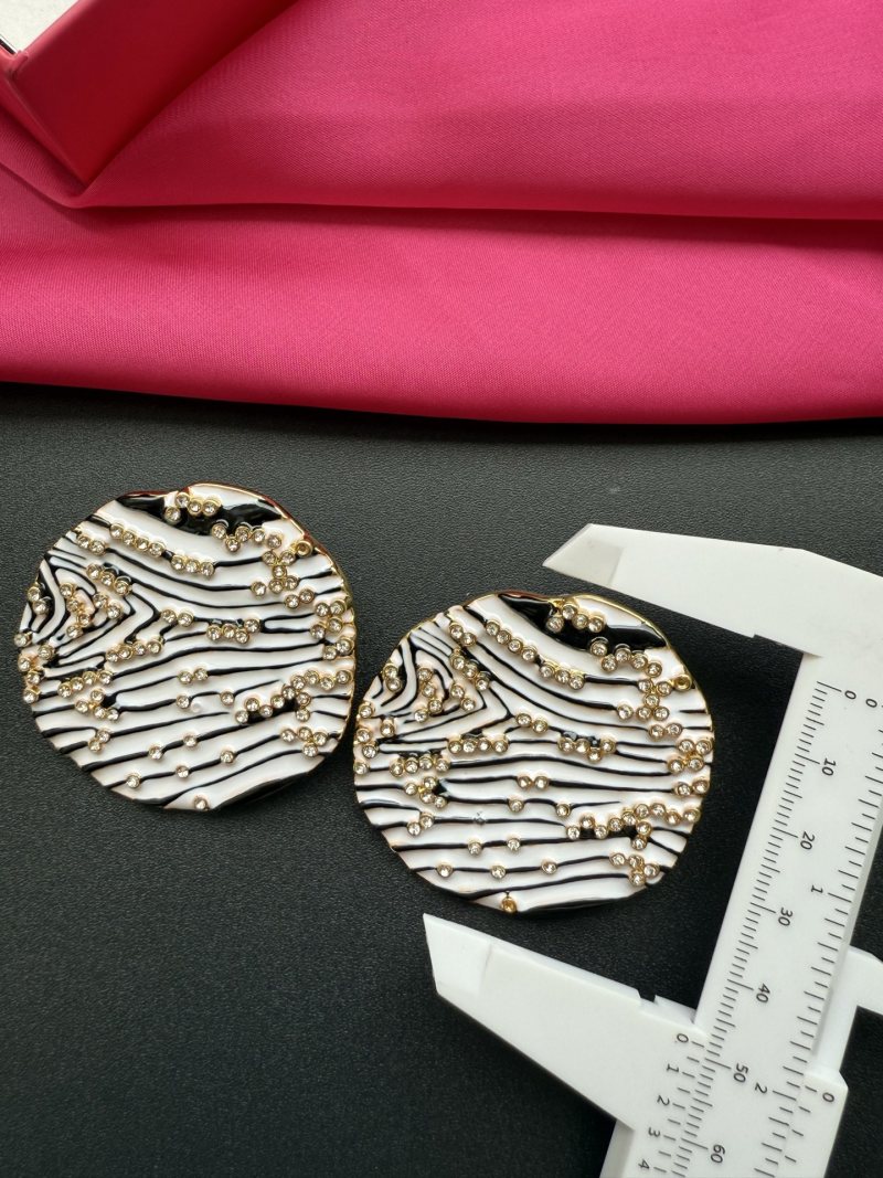 Серьги с зебровым узором и бусинами Schiaparelli