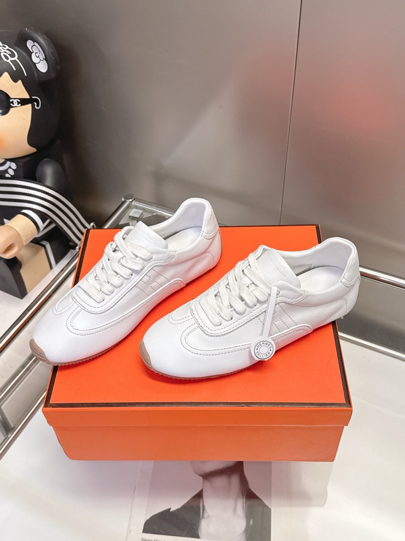 Белые кожаные кроссовки Hermès