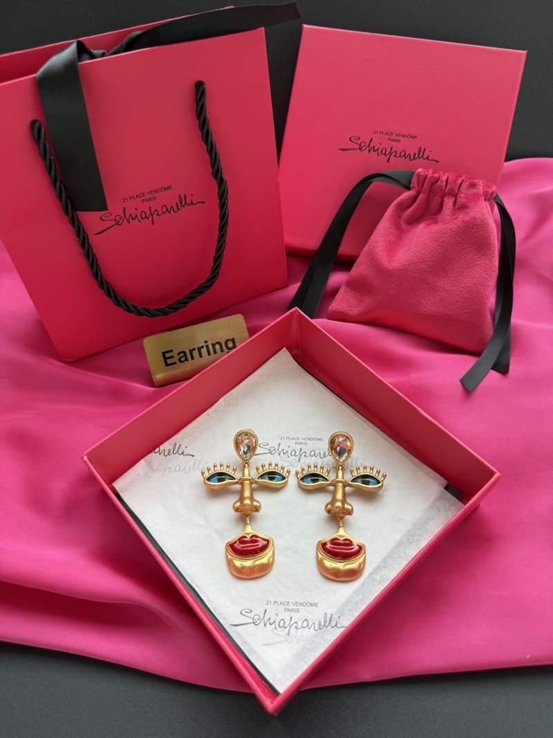 Серьги Schiaparelli с глазами и губами