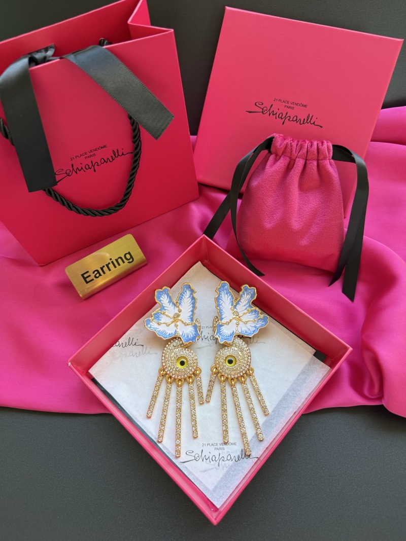 Серьги Schiaparelli с глазом и перьями
