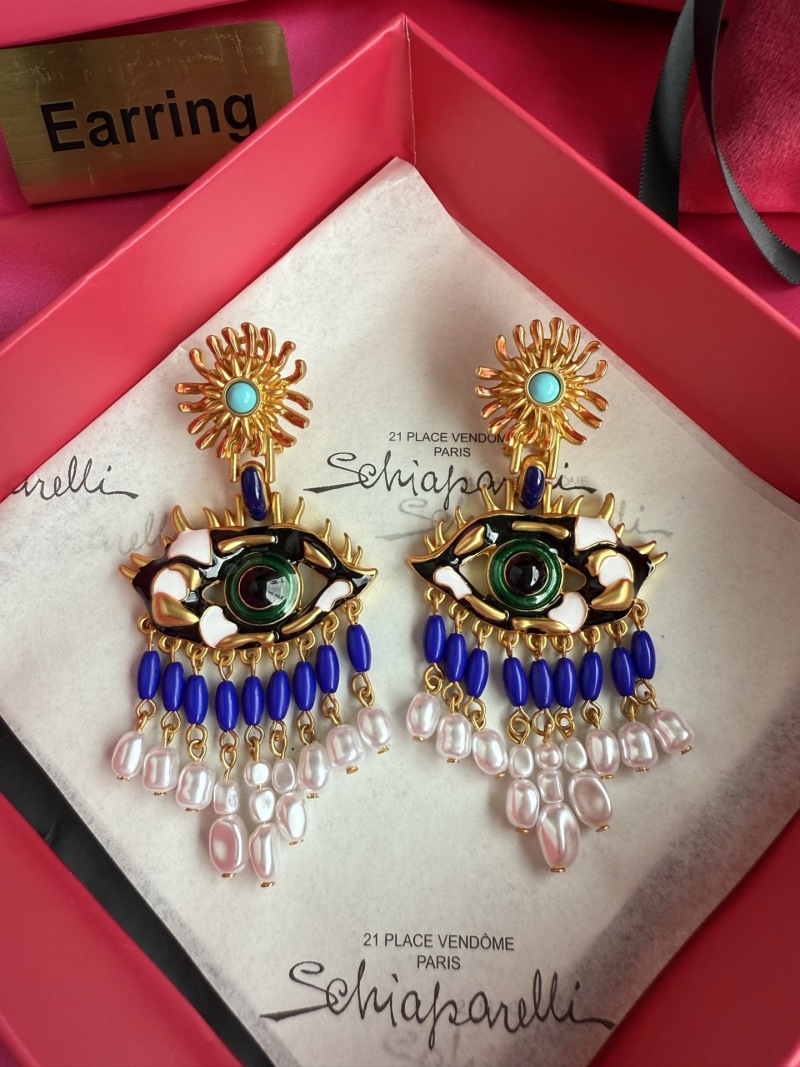 Серьги Schiaparelli с глазом и подвесками