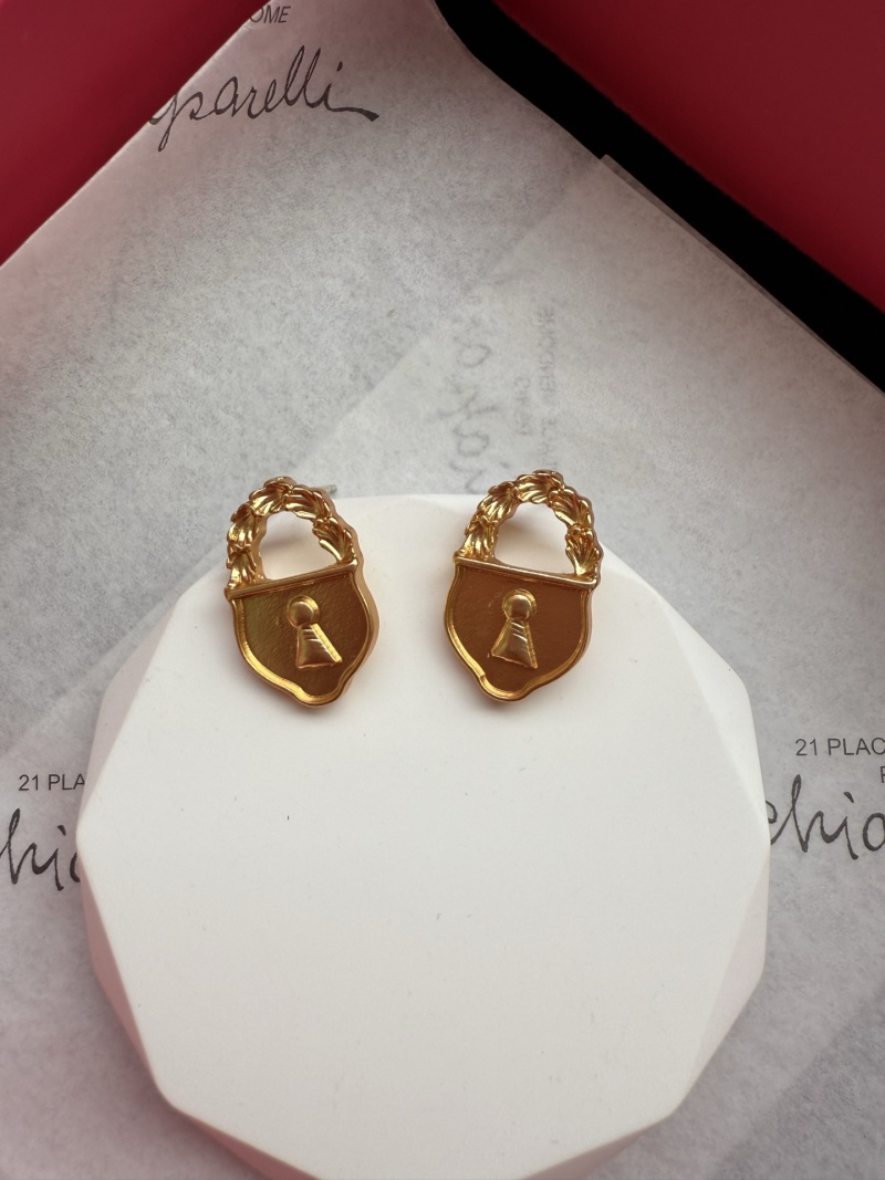 Серьги в форме замка Schiaparelli