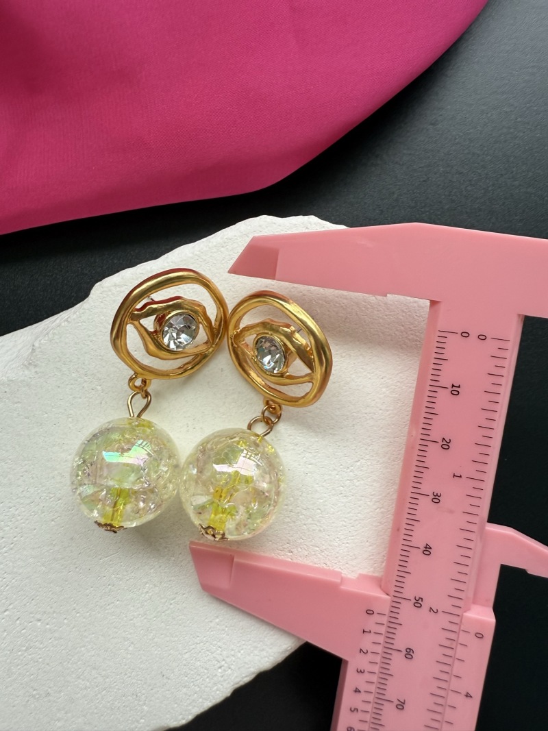 Серьги с подвесками в виде глаз Schiaparelli