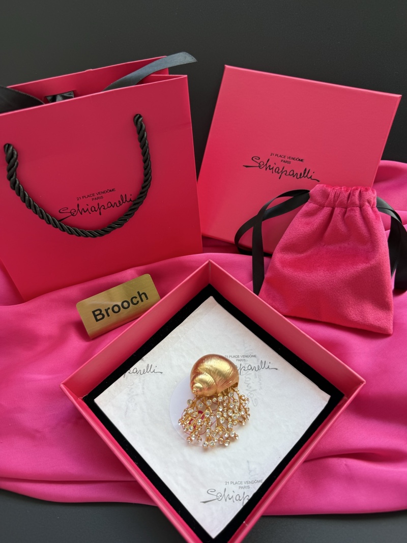 Брошь в виде улитки с кристаллами Schiaparelli