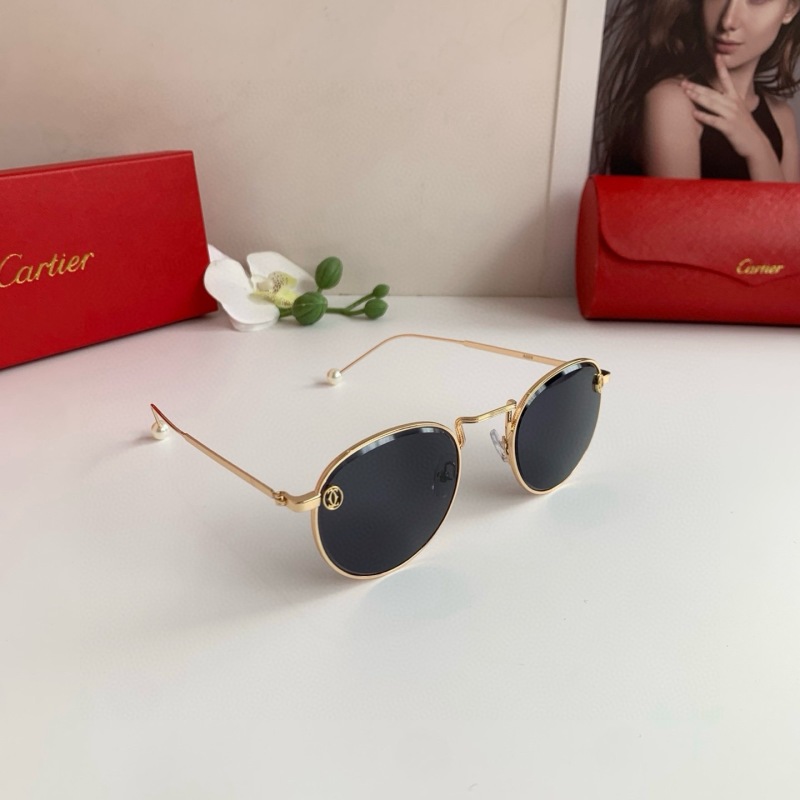 Круглые солнечные очки Cartier в золотой оправе