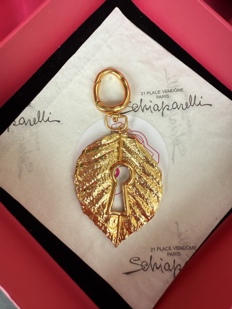 Подвеска в форме листа с ключом Schiaparelli