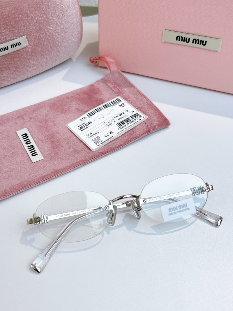 Солнцезащитные очки Miu Miu, золотистая оправа с узором под черепаху
