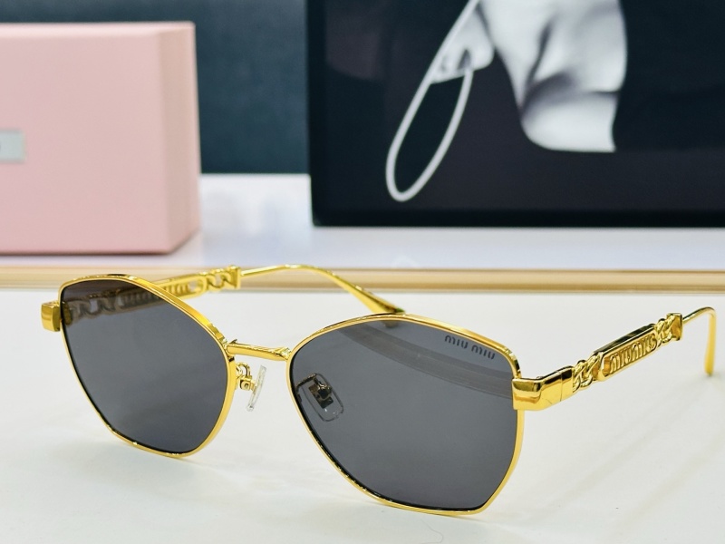 Солнцезащитные очки Miu Miu золотистые