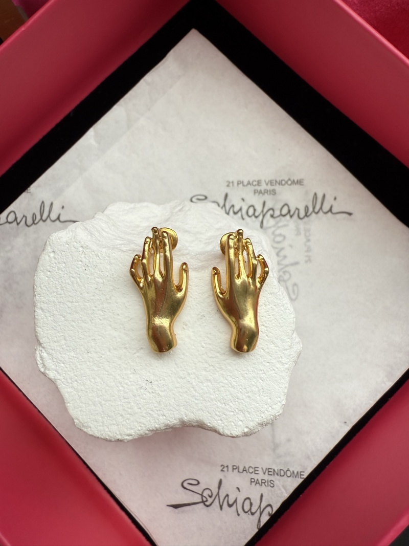 Серьги в виде рук Schiaparelli