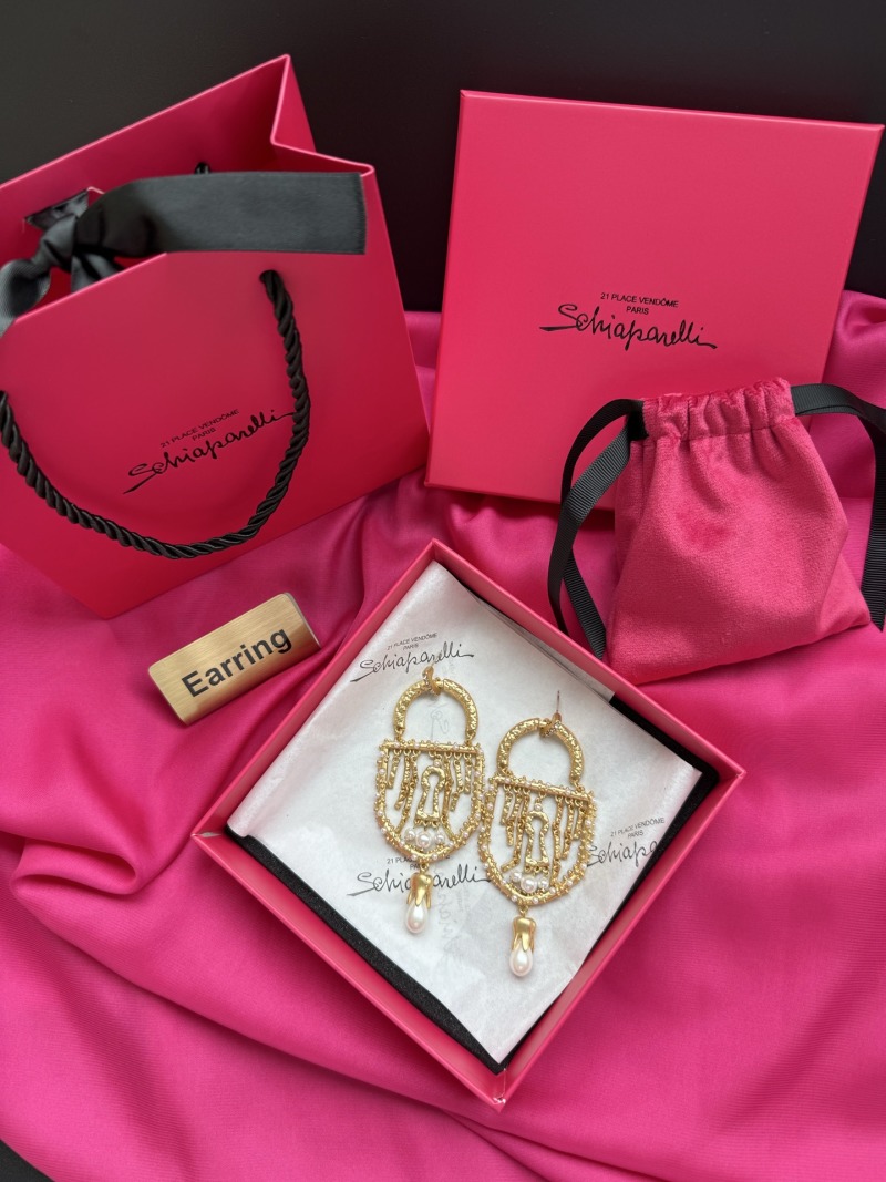 Золотистые серьги с жемчугом и кисточками Schiaparelli