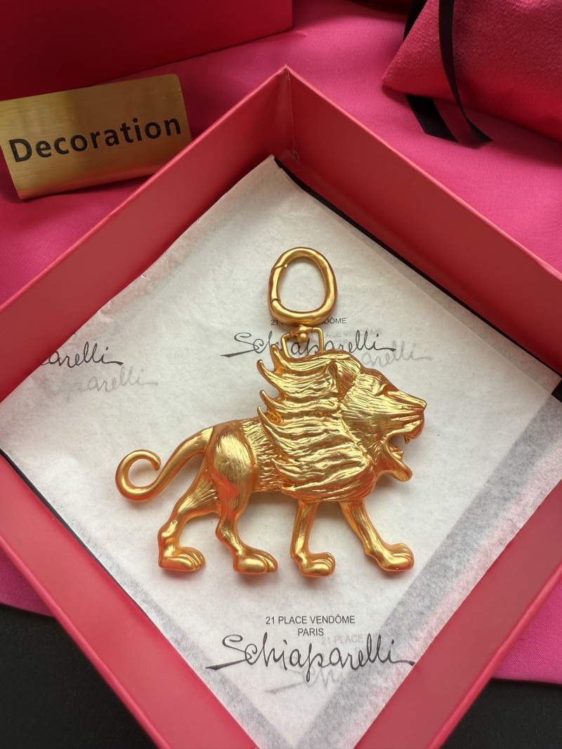 Золотистый кулоны в виде льва Schiaparelli