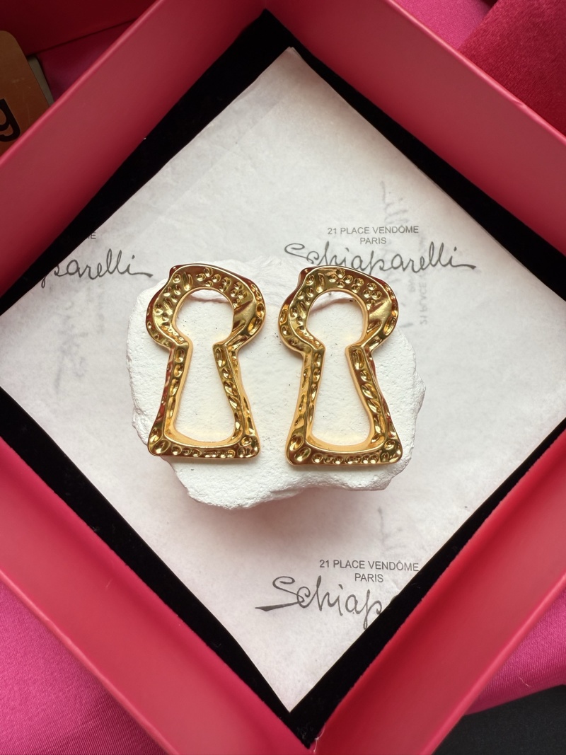 Серьги в форме ключа Schiaparelli