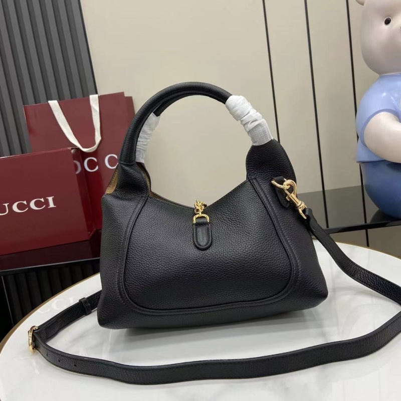 Черная кожаная сумка Gucci с золотой фурнитурой
