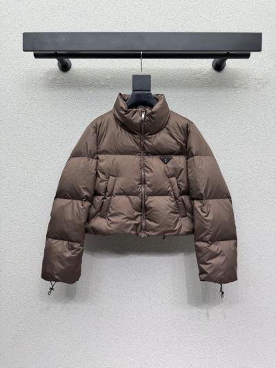 Пуховик Prada с треугольным логотипом