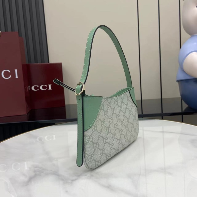 Сумка Gucci с монограммой и зелеными вставками