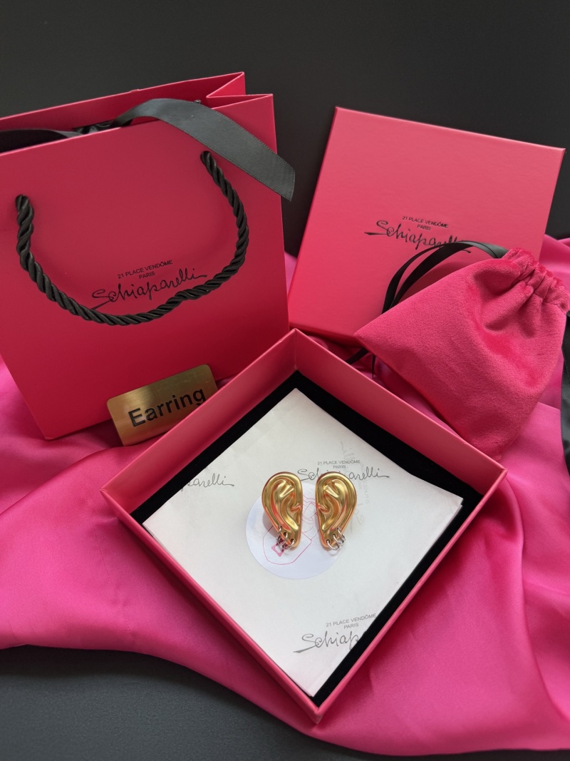 Серьги в форме уха Schiaparelli