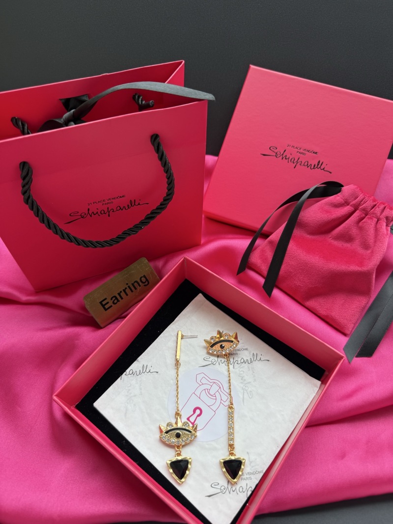 Серьги Schiaparelli с глазом и короной
