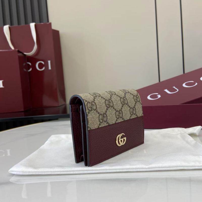 Портмоне Gucci с монограммой и логотипом GG