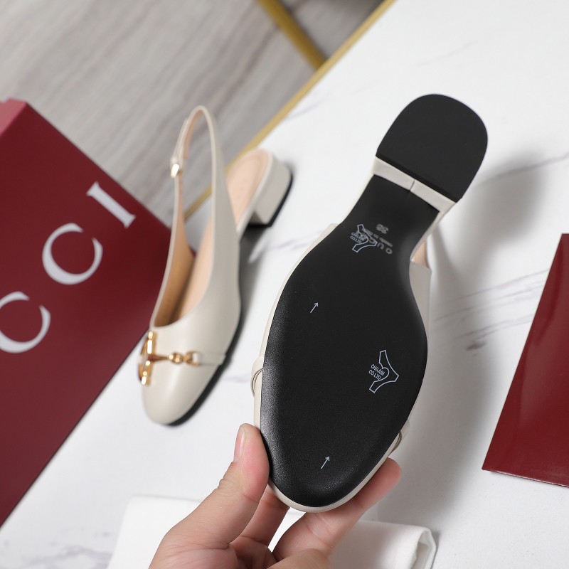 Женские сабо на каблуке с золотой застёжкой Gucci