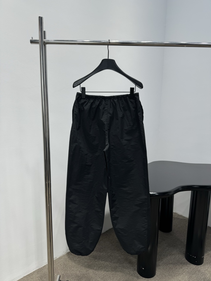 Черные брюки с логотипом Alexander Wang и декоративными шнурками