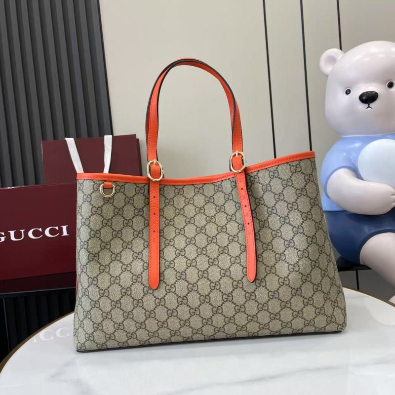 Сумка-тоут Gucci с принтом GG и оранжевыми вставка