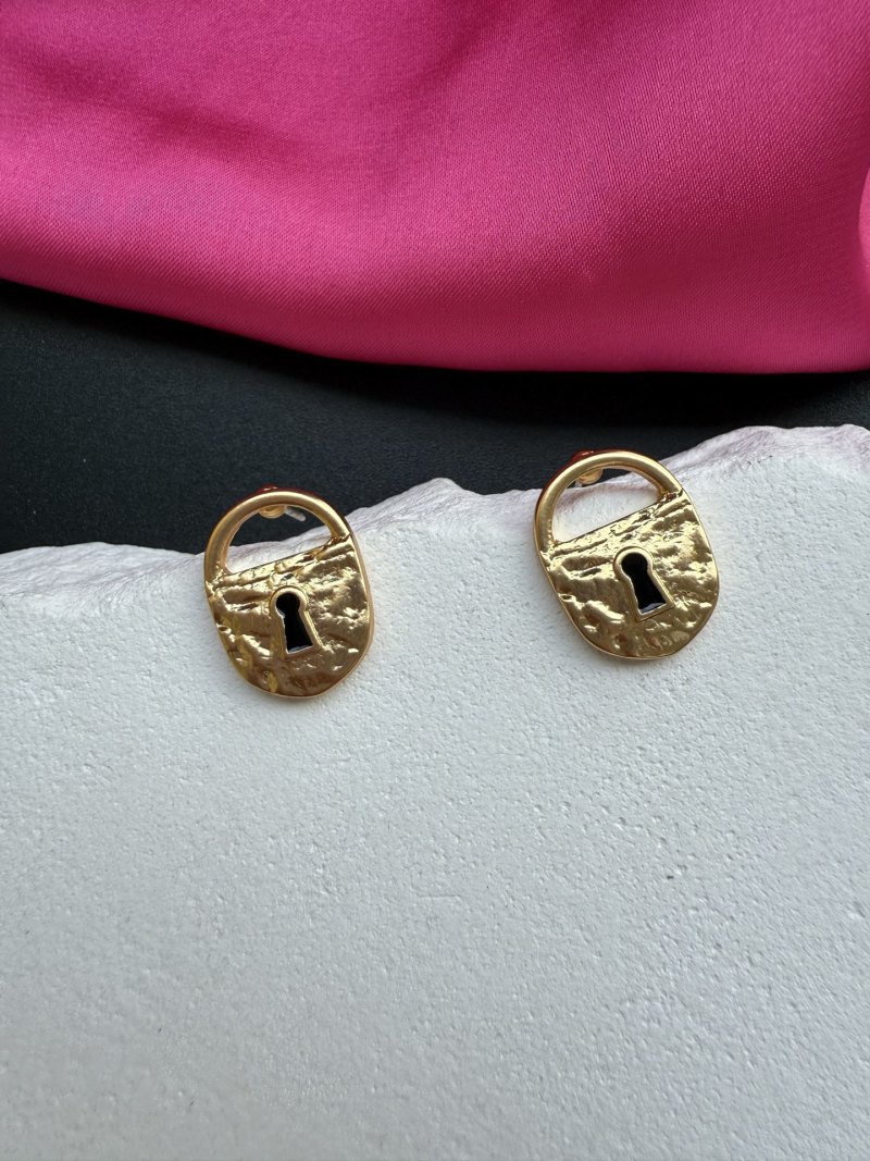 Серьги в виде замков Schiaparelli