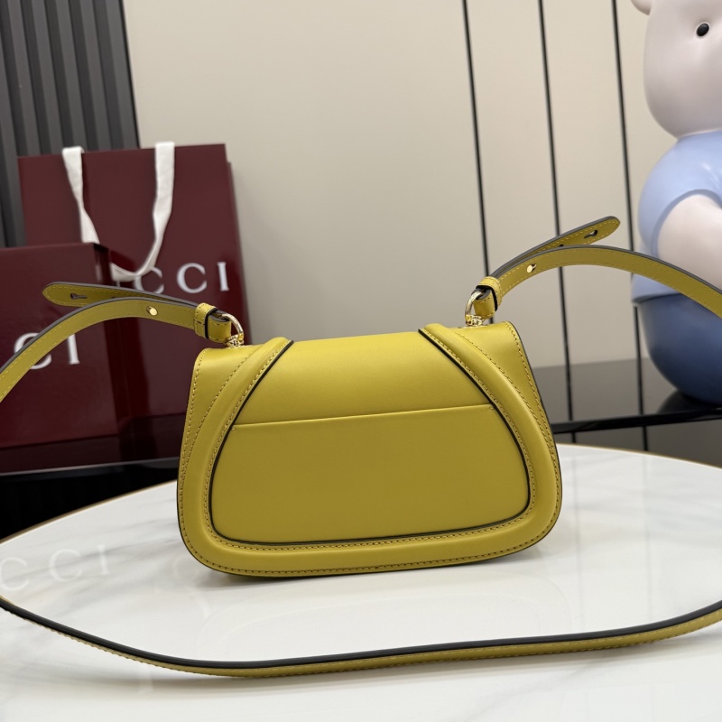 Желтая сумка Gucci с логотипом