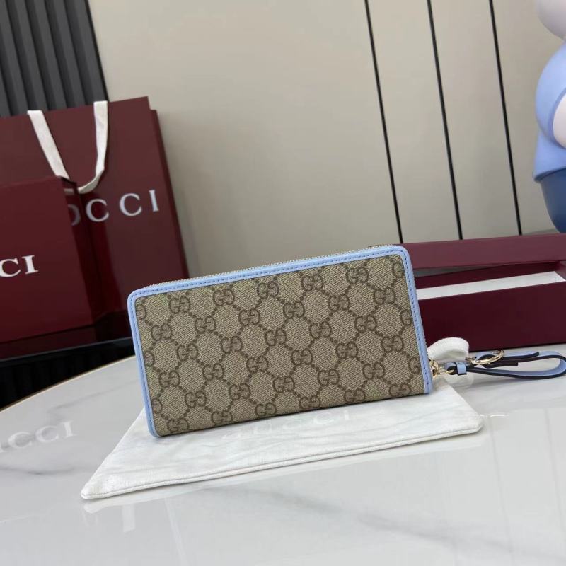 Портмоне Gucci с монограммой и голубой окантовкой