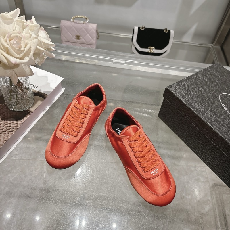 Женские кроссовки Prada оранжевые