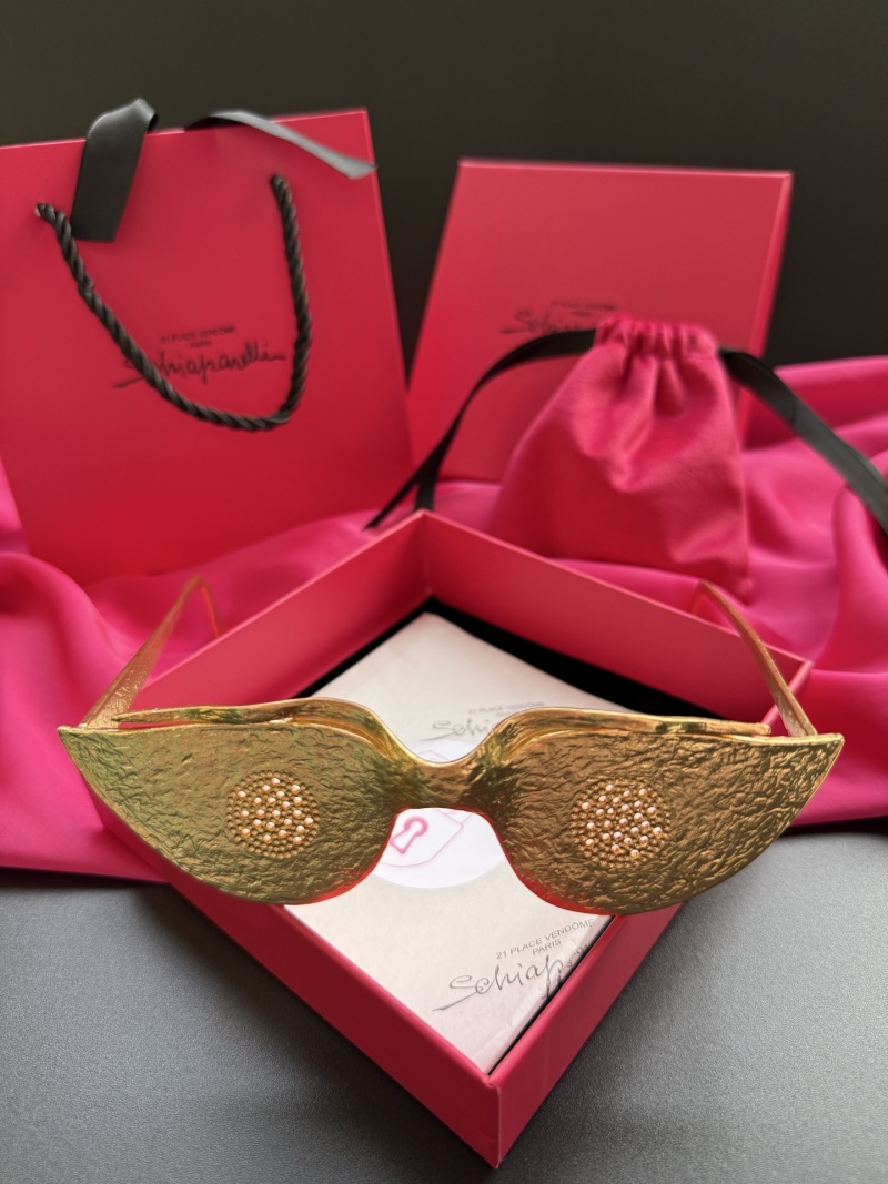 Золотистые декоративные очки Schiaparelli