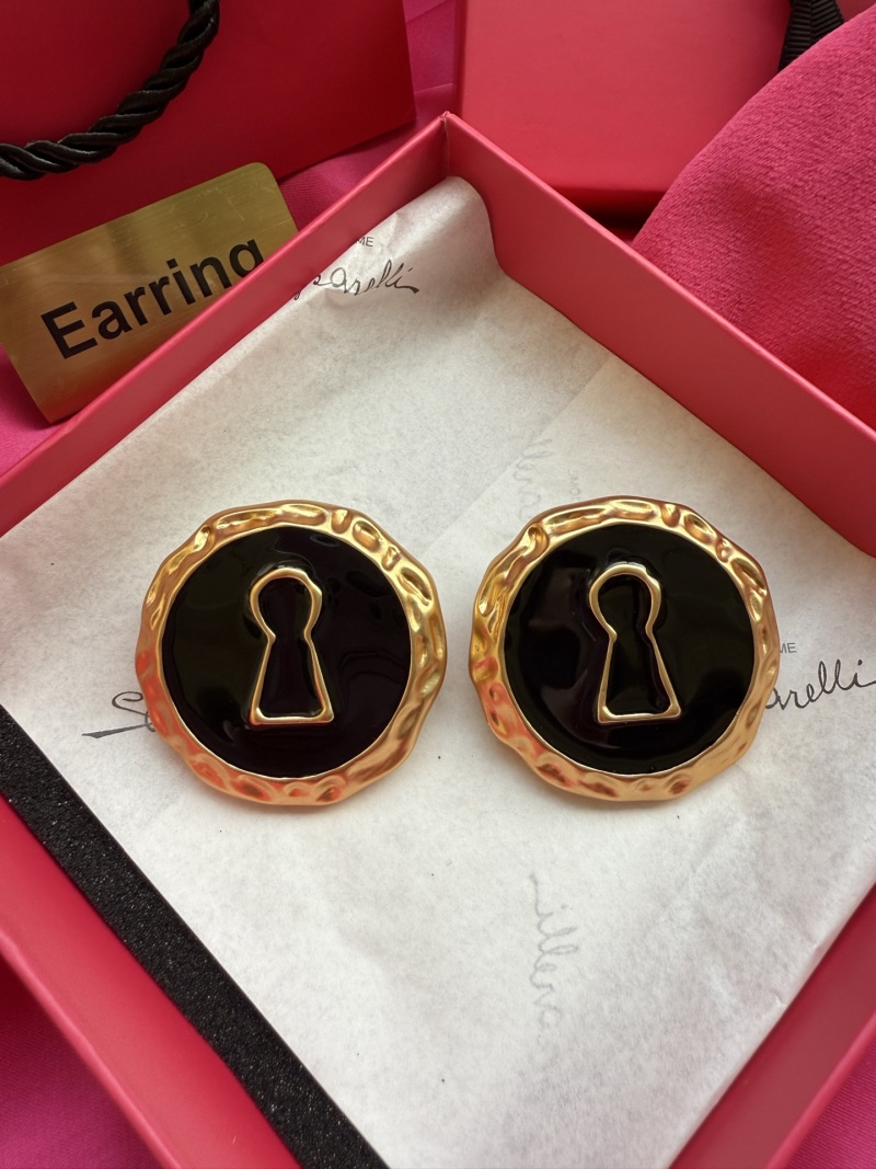 Серьги с ключом Schiaparelli
