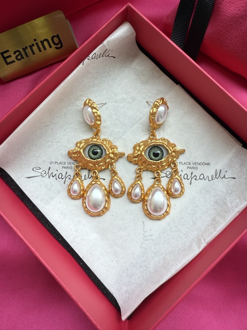 Серьги Schiaparelli с глазом и жемчугом