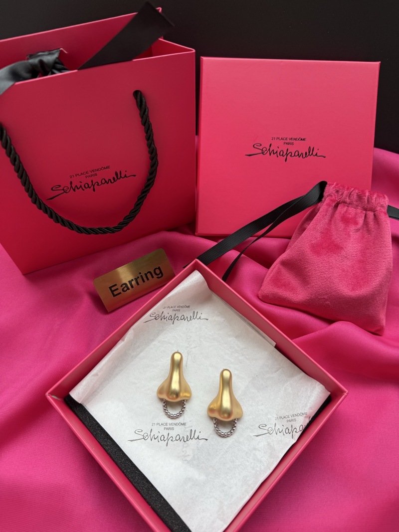 Серьги в форме носа Schiaparelli