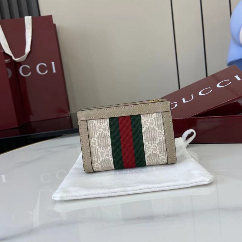Кошелёк Gucci с монограммой и логотипом GG