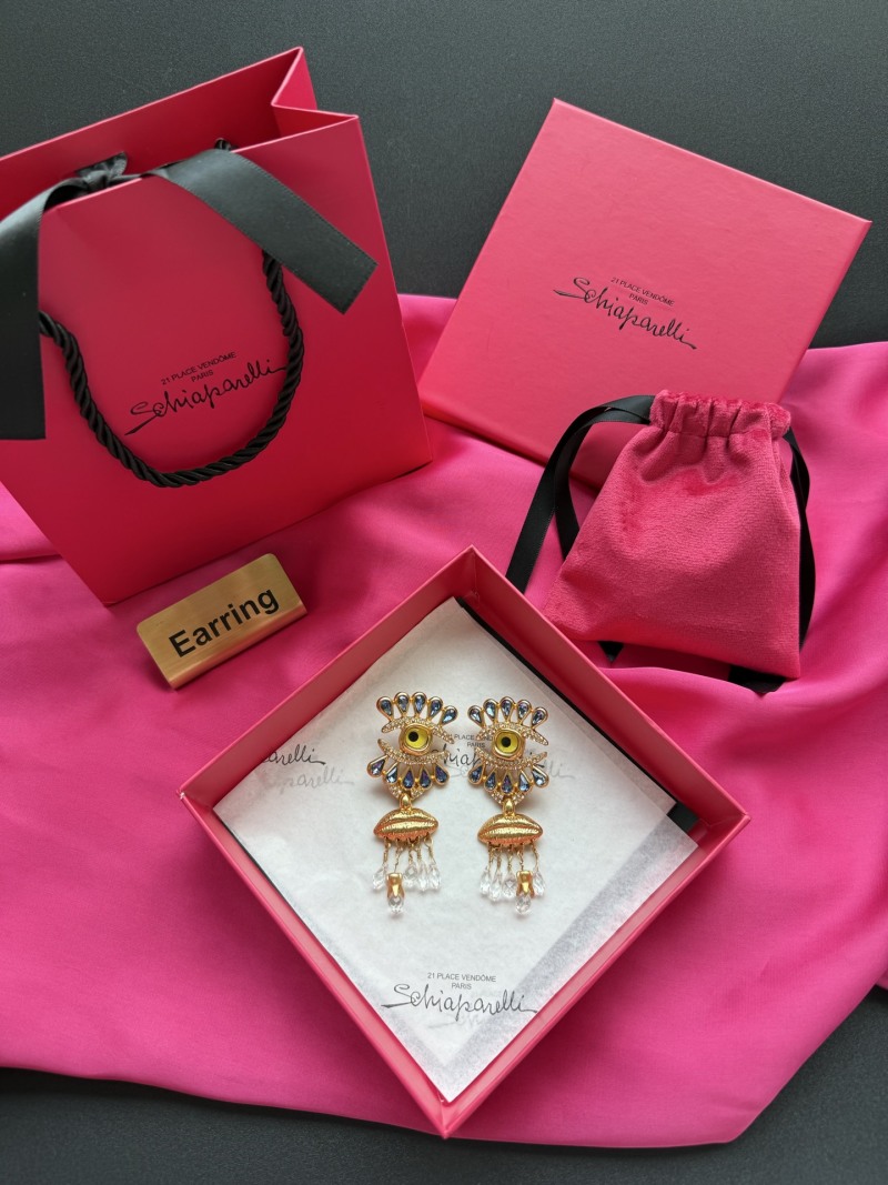 Серьги Schiaparelli с глазом и кристаллами