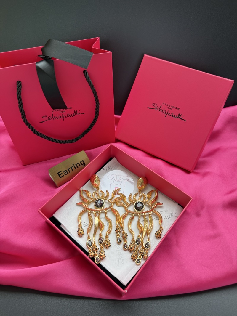 Серьги Schiaparelli с глазами и кристаллами
