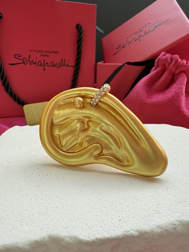 Брошь Schiaparelli