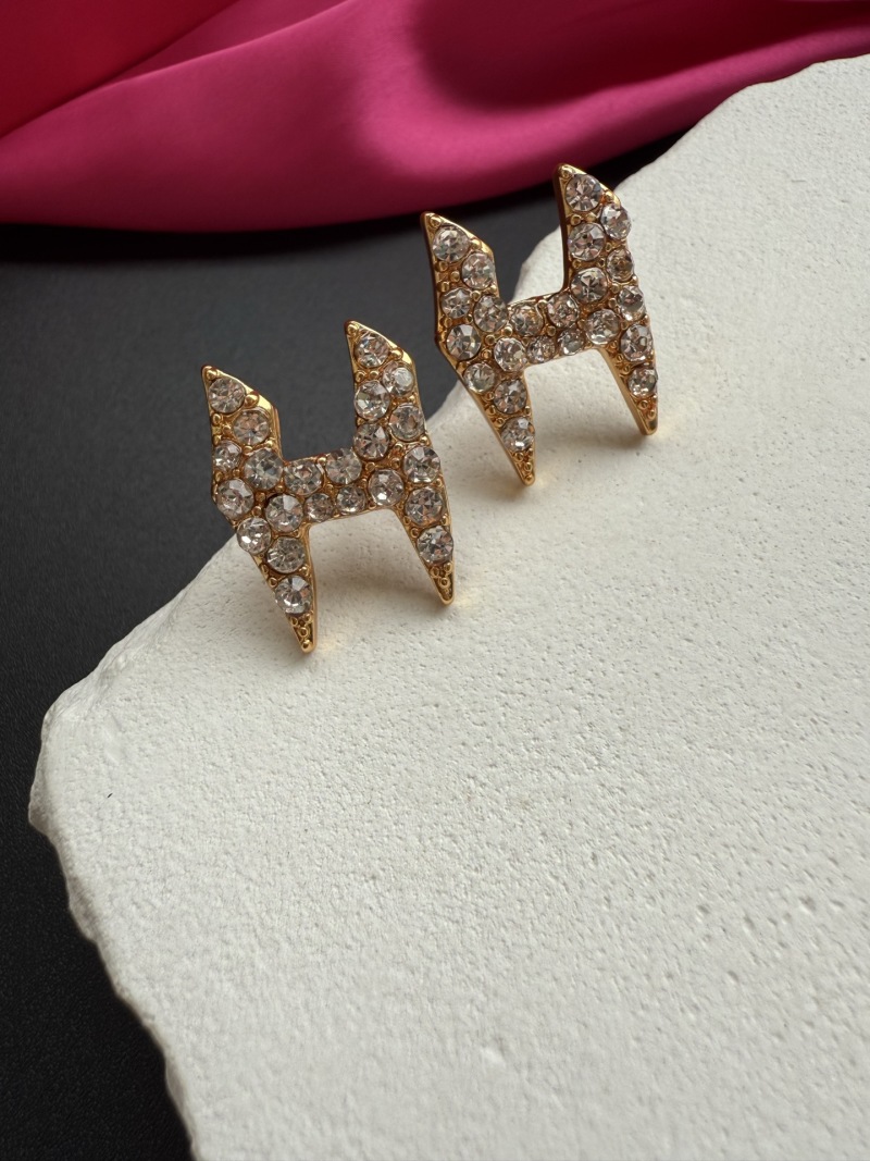 Серьги Schiaparelli в виде лошадей с кристаллами