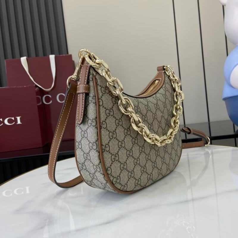 Сумка Gucci с цепочкой и принтом GG