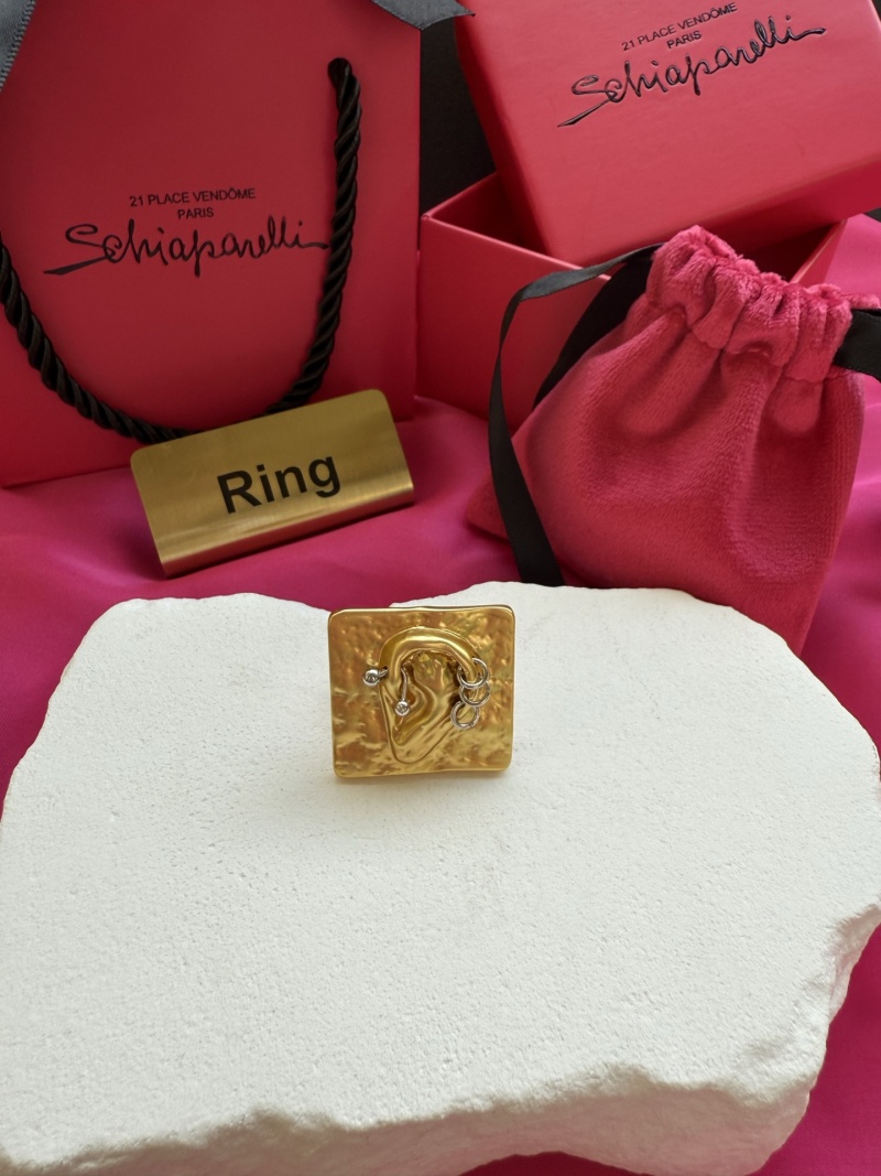 Золотистое кольцо в форме уха Schiaparelli