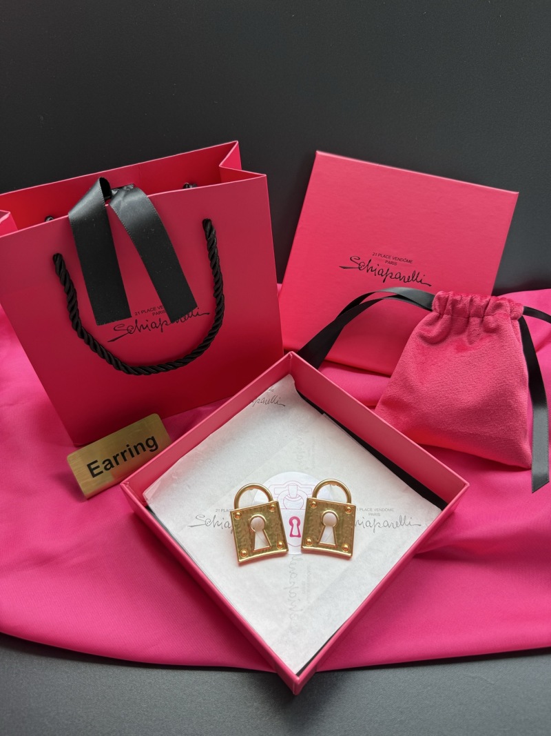Серьги в виде замков Schiaparelli