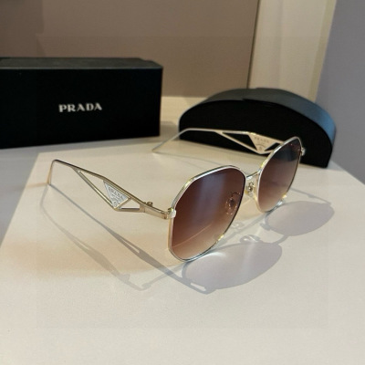 Солнцезащитные очки Prada серебристые