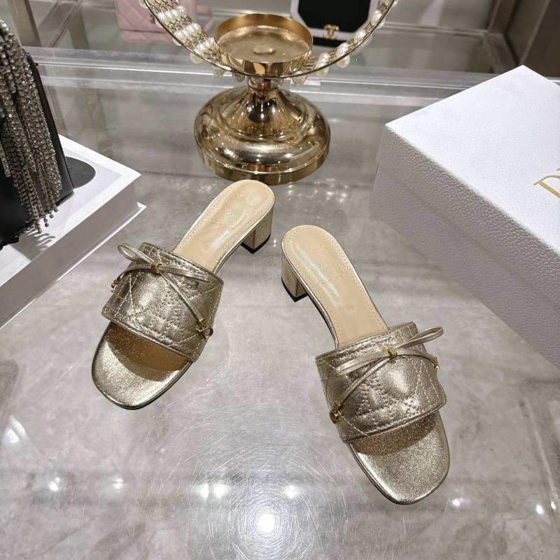 Женские сабо Dior золотого цвета с декоративным бантом