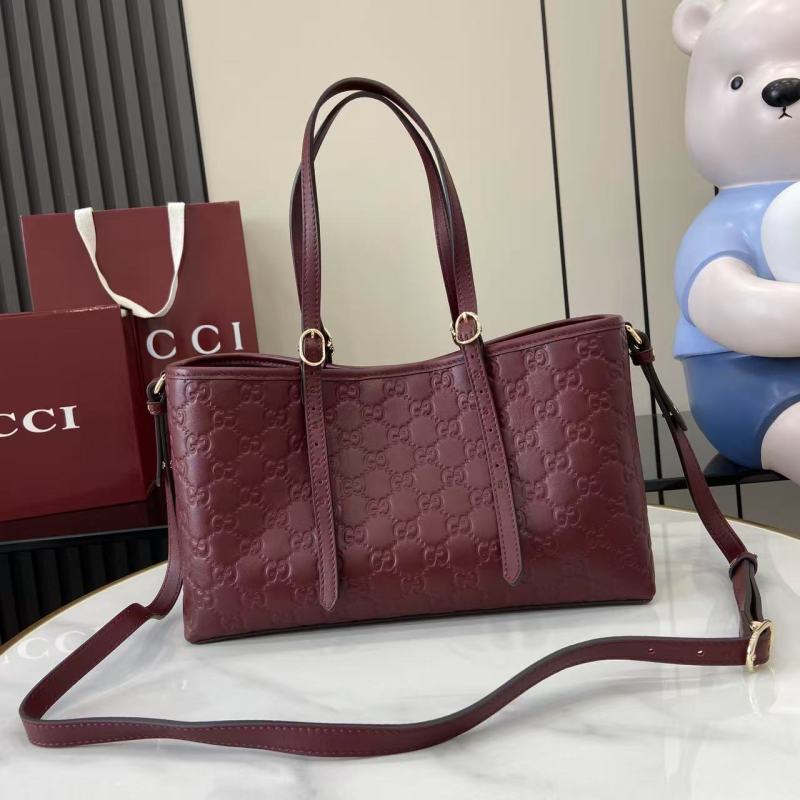 Сумка-тоут Gucci бордовая с тиснением