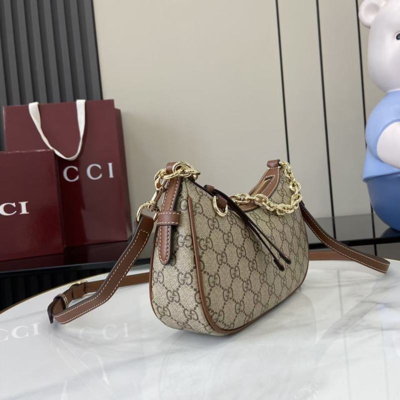 Сумка Gucci с цепочкой и принтом GG