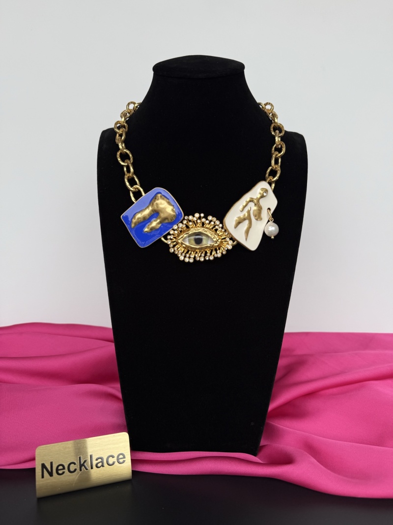 Колье Schiaparelli с декоративными элементами