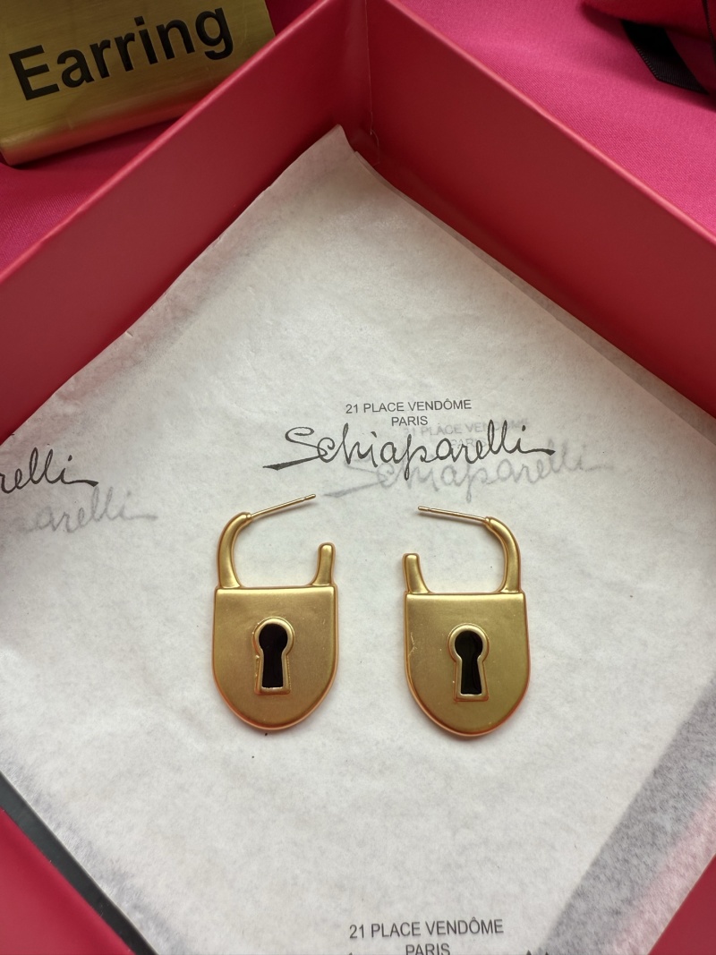 Серьги в форме замка Schiaparelli