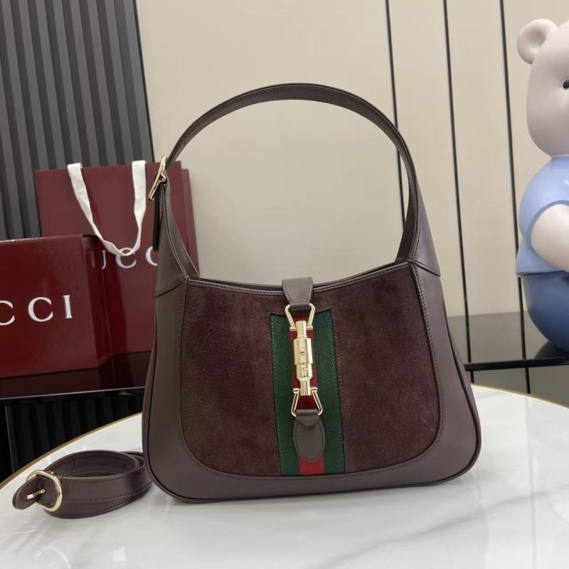 Сумка Gucci с замком и ремешком