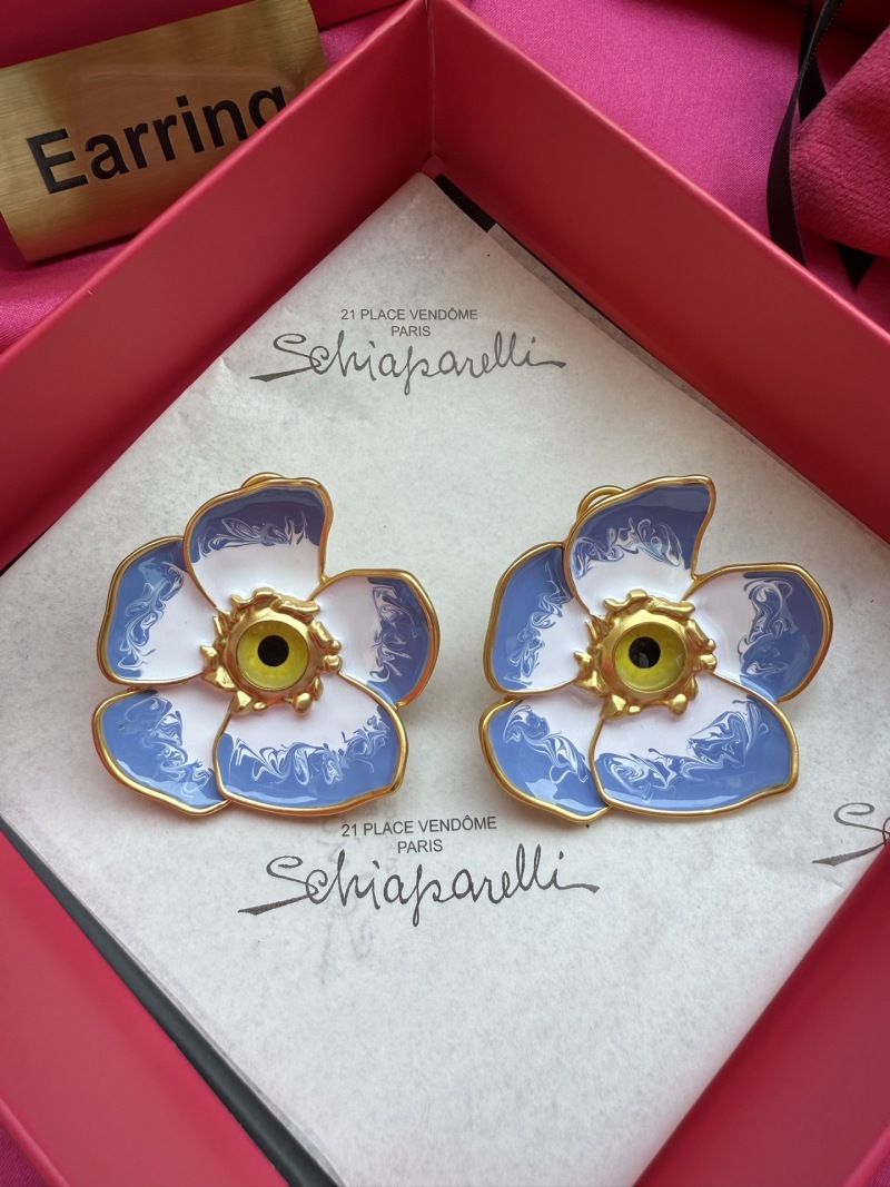 Серьги в виде цветка с эмалью и золотым ободком Schiaparelli