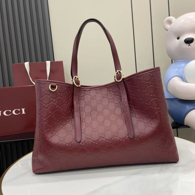 Сумка-тоут Gucci бордовая с тиснением